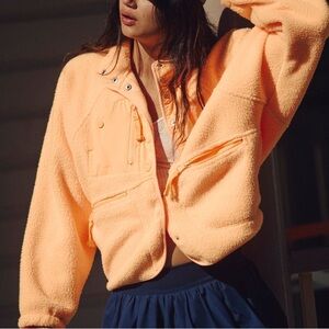 HIT THE SLOPES FLEECE JACKET NEON CLEMENTINE